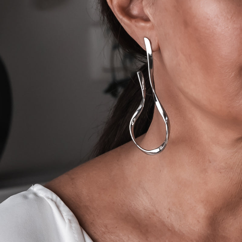 Asymmetric Earings (E-4061)