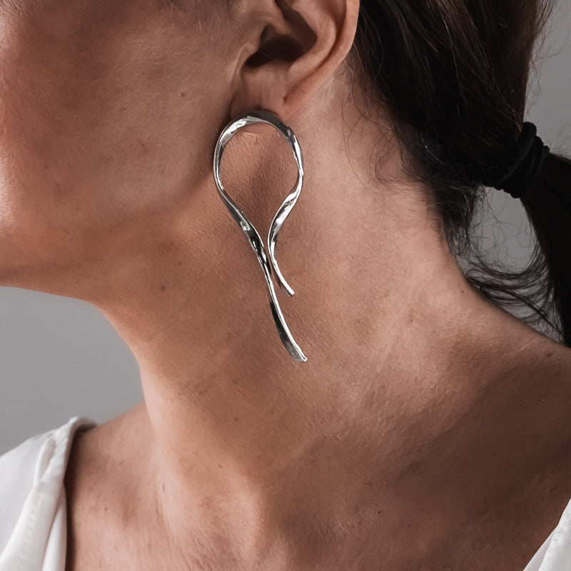 Asymmetric Earings (E-4061)